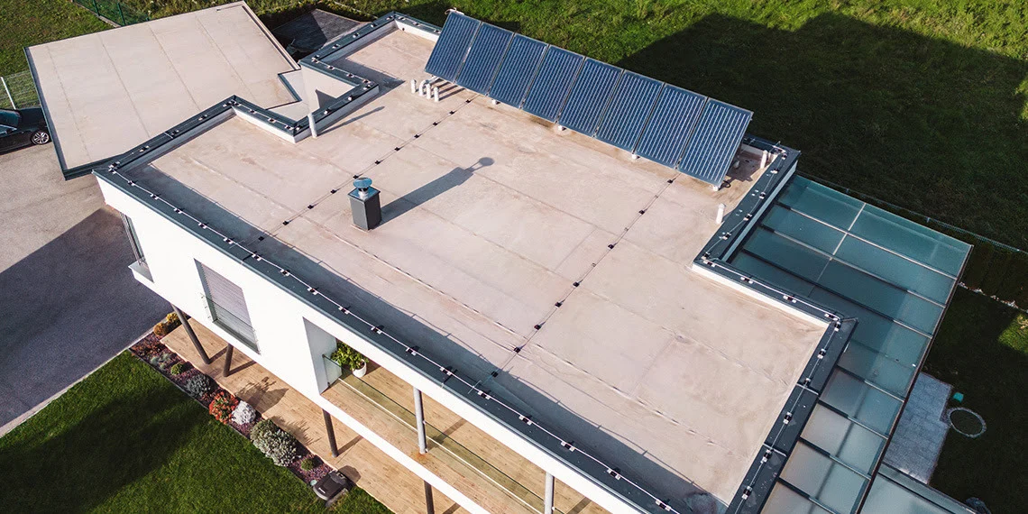 Roof Parapet Wall Waterproofing Guide for Flat and Low Slope Roofs